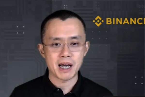 FILE - Binance CEO Changpeng Zhao answers a question during a Zoom meeting interview with The Associated Press on Nov. 16, 2021. Zhao the founder of Binance, the world’s largest cryptocurrency exchange, pleaded guilty Tuesday, Nov. 21, 2023, to a felony charge that he failed to take steps to prevent money laundering as the company agreed to pay more than $4 billion following an investigation by the U.S. government. (AP Photo/File)