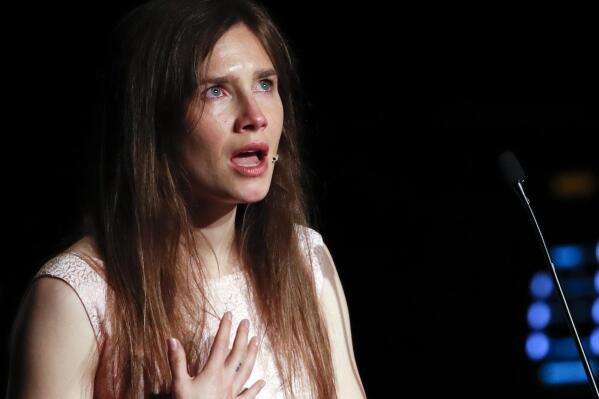 FILE - In this June 15, 2019 file photo, Amanda Knox gets emotional as she speaks at a Criminal Justice Festival at the University of Modena, Italy.   Knox is speaking out about her name being associated with the new film “Stillwater,” Friday, July 30, 2021, saying any connection rips off “my story without my consent at the expense of my reputation.” “Stillwater” stars Matt Damon as a father who flies to France to help his estranged daughter, who has been convicted of murdering her girlfriend.  (AP Photo/Antonio Calanni, File)
