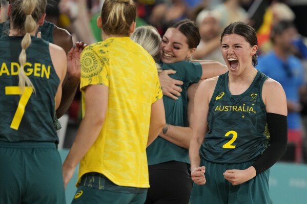 Jade Melbourne (2), of Australia, reacts after a women's bronze medal basketball game at Bercy Arena at the 2024 Summer Olympics, Sunday, Aug. 11, 2024, in Paris, France. (AP Photo/Michael Conroy)