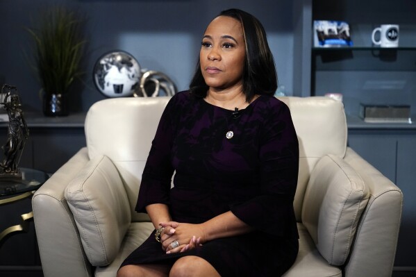 FILE - District Attorney for Fulton County, Fani Willis speaks during an interview with The Associated Press on Dec. 12, 2023, in Atlanta. Accusations that Willis had an inappropriate relationship with a special prosecutor she hired to seek convictions of Donald Trump and others for interfering in Georgia's 2020 election have led to renewed calls to remove Willis from the case.(AP Photo/Brynn Anderson)