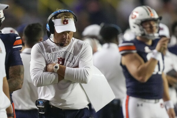 Auburn head coach Hugh Freeze walks on the sideline in the first half of an NCAA college football game against LSU in Baton Rouge, La., Saturday, Oct. 14, 2023. (AP Photo/Gerald Herbert)