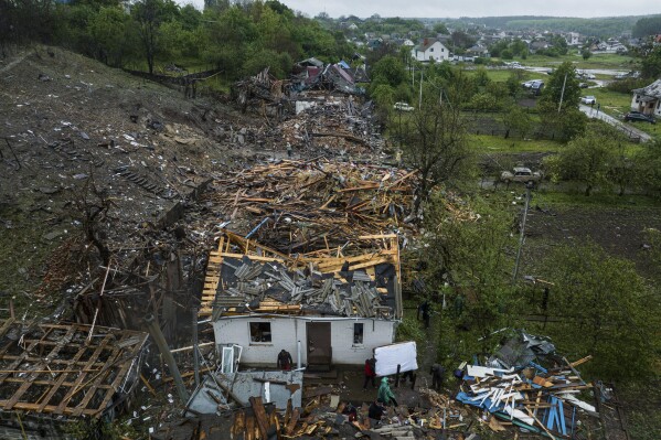 A view of residential houses destroyed by a Russian strike in Korostyshiv, Zhytomyr region, Ukraine, Sunday, May 25, 2025. (AP Photo/Evgeniy Maloletka)