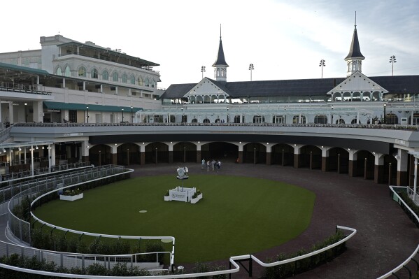 Visitors check out the new $200 million paddock at Churchill Downs Thursday, May 2, 2024, in Louisville, Ky. The 150th running of the Kentucky Derby is scheduled for Saturday, May 4. (AP Photo/Charlie Riedel)