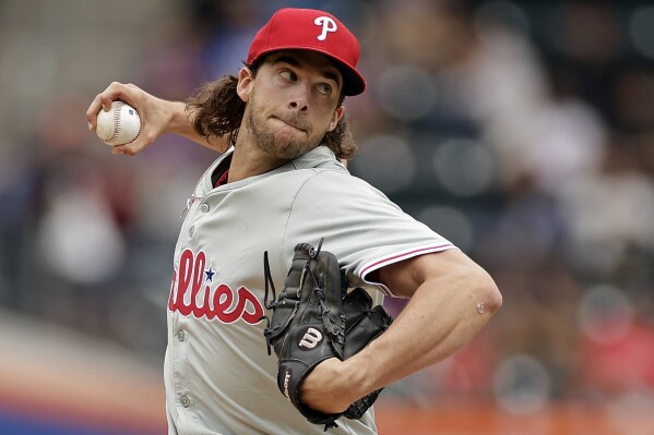 Philadelphia Phillies pitcher Aaron Nola throws during the second inning of a baseball game against the New York Mets, Tuesday, May 14, 2024, in New York. (AP Photo/Adam Hunger)