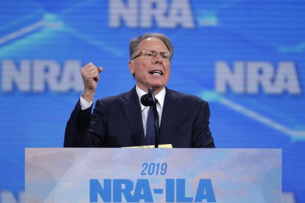 FILE - In this April 26, 2019, file photo, Nation Rifle Association Executive Vice President Wayne LaPierre speaks at the association's Institute for Legislative Action Leadership Forum at Lucas Oil Stadium in Indianapolis. LaPierre's testimony during the NRA's high-stakes bankruptcy trial offered a rare window into the work and habits of the notoriously secretive titan of the American firearms movement. (AP Photo/Michael Conroy, File)