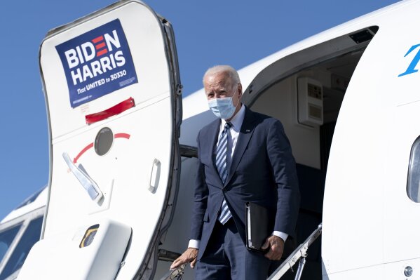 Democratic presidential candidate former Vice President Joe Biden arrives at Hagerstown Regional Airport in Hagerstown, Md., Tuesday, Oct. 6, 2020, to travel to Gettysburg, Pa. (AP Photo/Andrew Harnik)