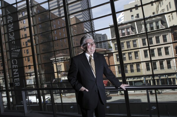 Stanley Aronoff poses inside the Aronoff Center for the Arts in Cincinnati, March 30, 2012. Aronoff, a Republican who spent nearly 40 years in the Ohio Legislature, including eight as the powerful Senate president, died peacefully Wednesday evening, Jan. 31, 2024, said Tina Donnelly, managing partner at the law firm Aronoff, Rosen & Hunt. He was 91. (Jeff Swinger/The Cincinnati Enquirer via AP)