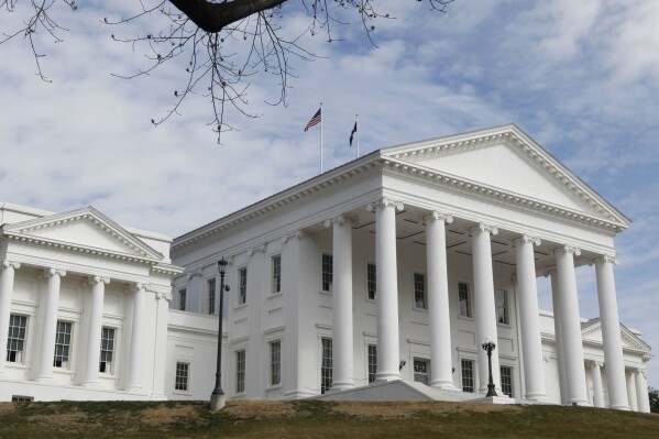 Flags wave on the roof of the State Capitol in Richmond, Va., Saturday Feb. 26, 2011. (AP Photo/Steve Helber, File)