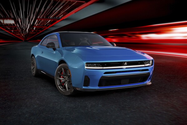 The all-new Dodge Charger SIXPACK H.O., shown here in a photo released by Stellantis, offers performance choices via multi-energy powertrain options. Dodge is unveiling two battery-powered versions of the Charger but the Stellantis brand, which has carved out a market niche of selling high performance cars, will keep selling a gas-powered Charger, minus the big V8. (Stellantis via AP)