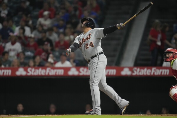 Detroit Tigers designated hitter Miguel Cabrera (24) singles during the fifth inning of a baseball game against the Los Angeles Angels in Anaheim, Calif., Saturday, Sept. 16, 2023. Kerry Carpenter scored. (AP Photo/Ashley Landis)