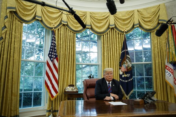 
              In this Aug. 27, 2018, photo, President Donald Trump listens during a phone call with Mexican President Enrique Pena Nieto about a trade agreement between the United States and Mexico, in the Oval Office of the White House. Trump is making trade policy the connective tissue that ties together his “America First” foreign policy and his political strategy for the 2020 presidential election.  (AP Photo/Evan Vucci)
            