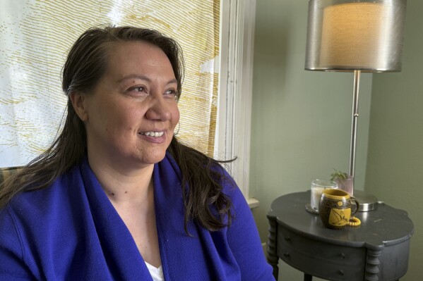 Siniva Bennett, chairman of Samoa Pacific Development Corporation, is sitting at his home in Portland, Oregon on Monday, May 19, 2025 (AP Photo/Claire Rush).