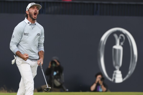 Max Homa of the United States reacts after sinking a birdie putt on the 18th green during his second round of the British Open Golf Championships at Royal Troon golf club in Troon, Scotland, Friday, July 19, 2024. (ĢӰԺ Photo/Scott Heppell)
