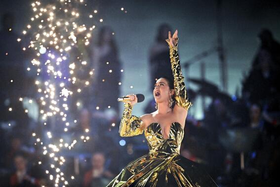 Katy Perry performs during the concert at Windsor Castle in Windsor, England, Sunday, May 7, 2023, celebrating the coronation of King Charles III. It is one of several events over a three-day weekend of celebrations. (Leon Neal/Pool Photo via AP)