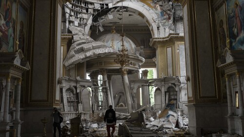 Church staff inspect damage inside the Odessa Transfiguration Cathedral in Odessa, Ukraine, Sunday, July 23, 2023, following Russian missile attacks.  (AP Photo/Jae C. Hong)