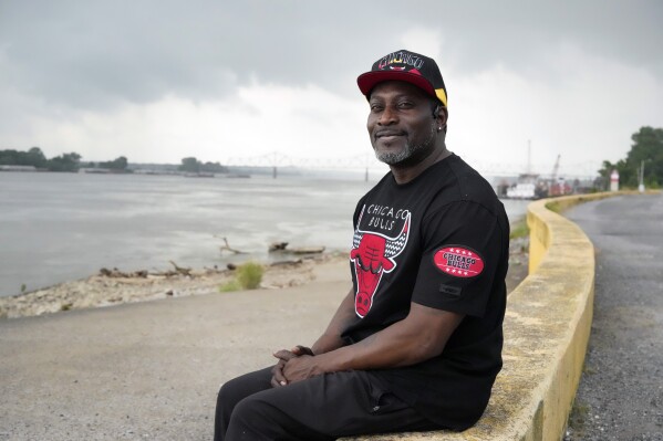 Resident and community leader Steve Tarver poses for a photo Thursday, May 23, 2024, in Cairo, Ill. Tarver left the flood-prone city for several years but has since returned home. (AP Photo/Jeff Roberson)