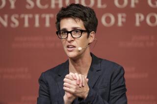 FILE - MSNBC television anchor Rachel Maddow, host of the Rachel Maddow Show, moderates the "Perspectives on National Security" panel on Oct. 16, 2017, in Cambridge, Mass. Maddow returned to the air on Monday, April 11, 2022, with some bad news for her fans: Starting in May, she will be doing her prime-time show just once a week. (AP Photo/Steven Senne, File)