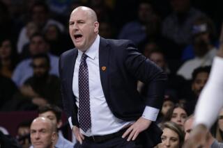 FILE - Chicago Bulls head coach Jim Boylen calls out to his team during the first half of an NBA basketball game against the Brooklyn Nets on Friday, Jan. 31, 2020, in New York. Coach Jim Boylen and USA Basketball will play at Puerto Rico on July 1 and Cuba on July 4 in the next round of qualifying for the 2023 Basketball World Cup.(AP Photo/Frank Franklin II, File)