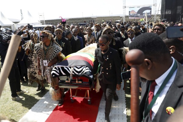 Pallbearers escort the coffin of Prince Mangosuthu Buthelezi, during his funeral in Ulundi, South Africa, Saturday, Sept. 16, 2023. Buthelezi, a controversial South African politician and traditional minister of the Zulu nation, was laid to rest Saturday after dying at the age of 95 this week. (AP Photo)
