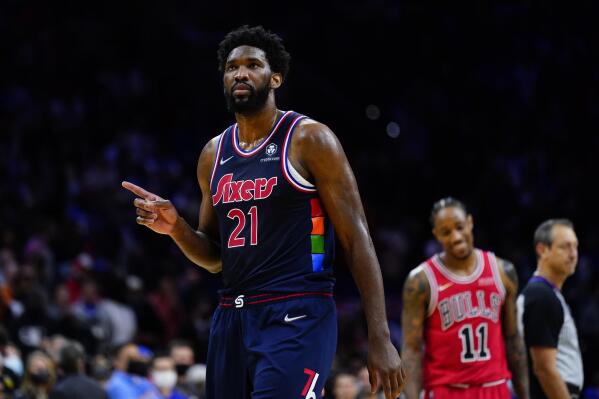 Philadelphia 76ers' Joel Embiid wags his finger after blocking a shot by Chicago Bulls' DeMar DeRozan during the final minute of an NBA basketball game, Wednesday, Nov. 3, 2021, in Philadelphia. (AP Photo/Matt Slocum)