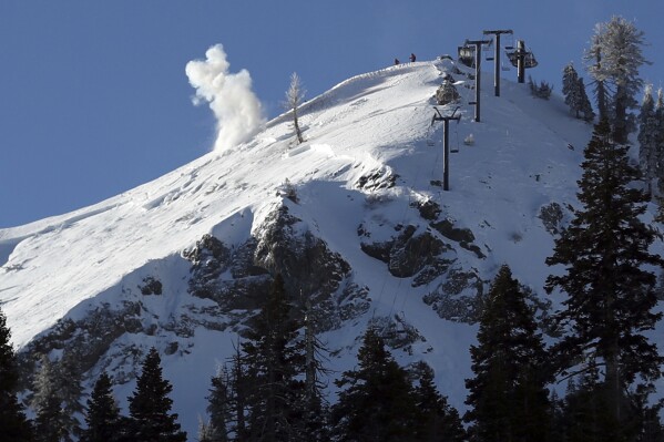 FILE -A charge is detonated to remove avalanche risk near the scene of Wednesday's deadly slide at Palisades Tahoe Ski resort in Olympic Valley, Calif., on Thursday, Jan. 11, 2024. As a massive winter storm dumped snow across much of the western U.S., winter sport enthusiasts headed to ski resorts and backcountry slopes ahead of the long Martin Luther King Jr. Day weekend. But in many areas, the storm brought a high risk of avalanche conditions.(Scott Strazzante/San Francisco Chronicle via AP, File)