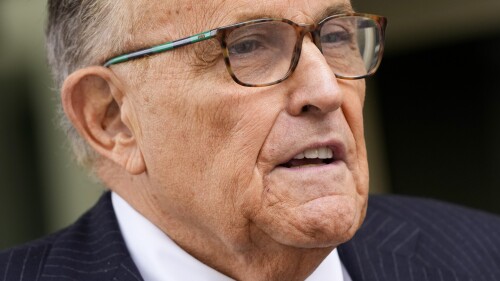 FILE - Rudy Giuliani speaks with reporters as he departs the federal courthouse, May 19, 2023, in Washington. Giuliani, who as a member of Donald Trump's legal team sought to overturn 2020 presidential election results in battleground states, was interviewed recently by investigators with the Justice Department special counsel's office, according to a person familiar with the matter. (AP Photo/Patrick Semansky, File)