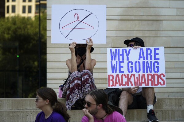 FILE - Demonstrators gather at the federal courthouse in Austin, Texas, following the U.S. Supreme Court's decision to overturn Roe v. Wade, June 24, 2022. A pregnant Texas woman whose fetus has a fatal diagnosis asked a court Tuesday, Dec. 5, 2023, to let her terminate the pregnancy, bringing what her attorneys say is the first lawsuit of its kind in the U.S. since Roe v. Wade was overturned last year. (AP Photo/Eric Gay, File)