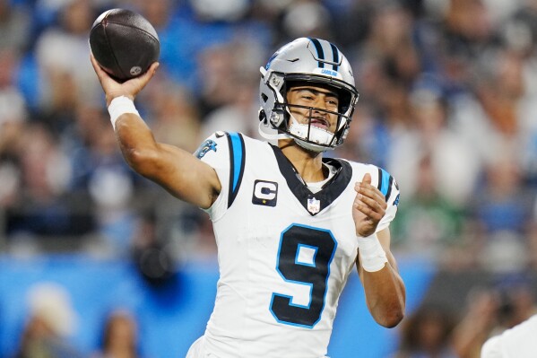 Carolina Panthers quarterback Bryce Young passes against the New Orleans Saints during the first half of an NFL football game Monday, Sept. 18, 2023, in Charlotte, N.C. (AP Photo/Rusty Jones)