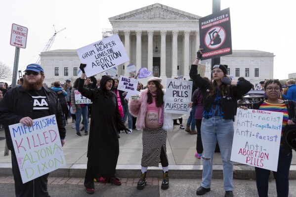 Anti-Abortion demonstrators protest outside of the Supreme Court during a rally Tuesday, March 26, 2024, in Washington.