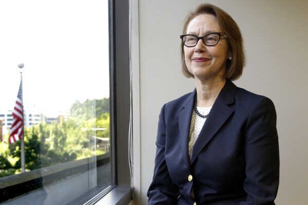 FILE - Oregon Attorney General Ellen Rosenblum poses for a photo at her office in Portland, Ore., July 13, 2016. Rosenblum, the first woman elected to the position, announced on Tuesday, Sept. 19, 2023, that she will not seek re-election after three terms. (AP Photo/Don Ryan, File)
