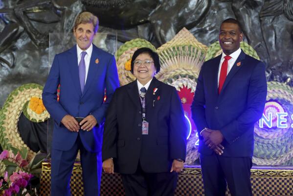From left to right, U.S. Special Presidential Envoy for Climate John Kerry, Indonesian Environment and Forestry Minister Siti Nurbaya Bakar and U.S. Environmental Protection Agency Administrator Michael Regan pose for photographers upon arrival for the G20 Joint Environment and Climate Ministers' Meeting in Nusa Dua, Bali, Indonesia on Wednesday, Aug. 31, 2022. (AP Photo/Firdia Lisnawati, Pool)