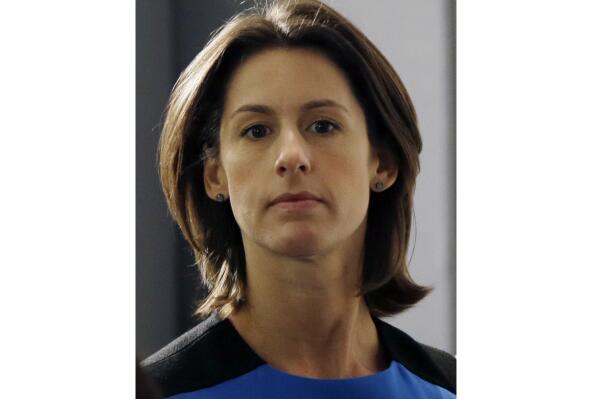 FILE - This Oct. 23, 2012 file photo shows Allison Gollust, communications director for New York Gov. Andrew Cuomo, in Troy, N.Y. On Tuesday, Feb. 15, 2022, WarnerMedia said that Gollust, the CNN executive whose relationship with Jeff Zucker led to his resignation as the cable network’s president, is leaving after an internal probe found violations of news standards. (AP Photo/Mike Groll, File)