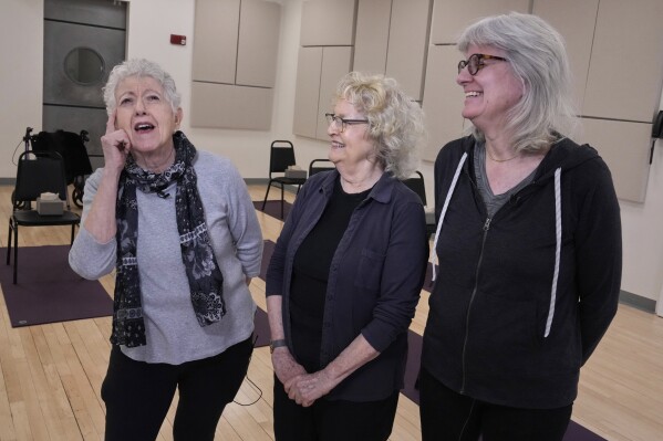 Marian Rodman, Harriet Luria and Carol Leister. (AP Photo/Richard Drew)