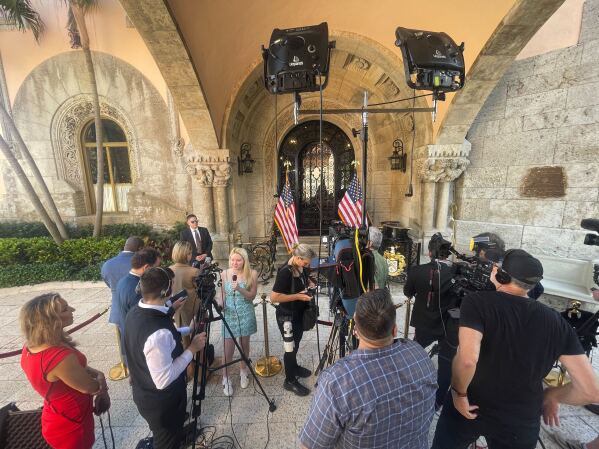 The press pool waits for former President Donald Trump to speak at his Mar-a-Lago resort in West Palm Beach, Florida on Thursday, Feb. 8, 2024. (AP Photo/Adriana Gomez Licon)