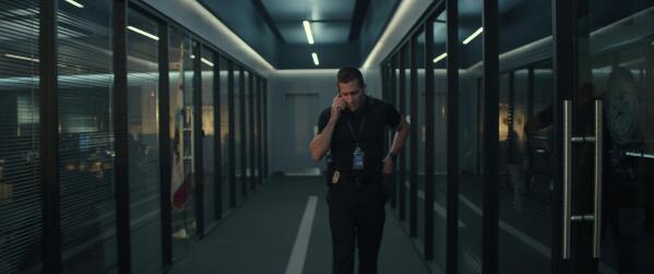 This image released by Netflix shows Jake Gyllenhaal in a scene from "The Guilty." (Netflix via AP)