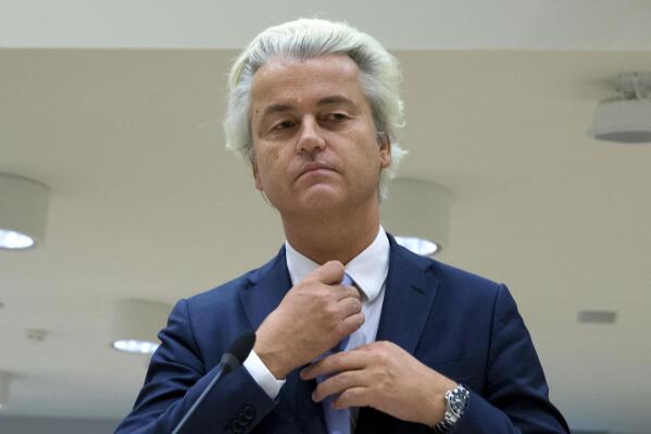 FILE - In this Nov. 23, 2016 file photo, populist anti-Islam lawmaker Geert Wilders prepares to address judges at the high-security court near Schiphol Airport in Amsterdam, during his hate-speech trial that pits freedom of expression against the Netherlands' anti-discrimination laws. A Dutch appeals court upheld Friday the conviction of anti-Islam lawmaker Geert Wilders for insulting Moroccans in comments he made at an election night gathering in 2014. He was cleared of incitement to hate and discrimination. (AP Photo/Peter Dejong, File)