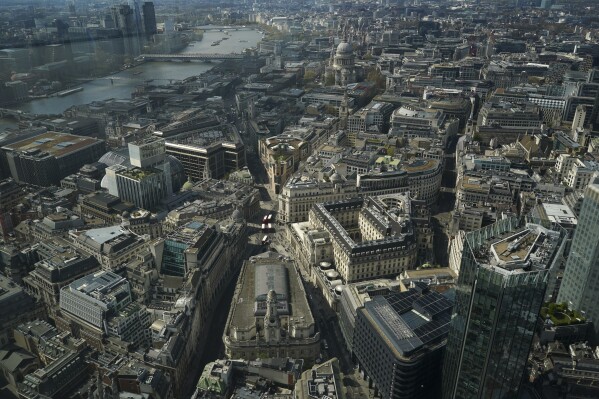 View of the Bank of England and the Royal Exchange from the Lookout viewing point, in London, Wednesday, April 9, 2025. (AP Photo/Alberto Pezzali, File)