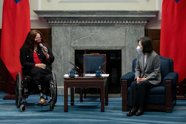 In this photo released by the Taiwan Presidential Office, U.S. Sen. Tammy Duckworth, D-Ill., left, meets with Taiwan's President Tsai Ing-wen at the Presidential Office in Taipei, Taiwan, Tuesday, May 31, 2022. On a visit to Taiwan, reiterated support for the island amid rising Chinese threats. (Taiwan Presidential Office via AP)