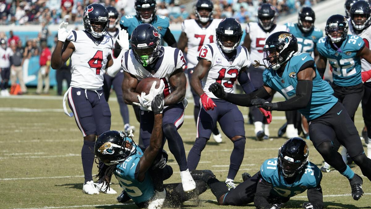 Pierce's run, Walker's gaffe help Texans topple Jags again