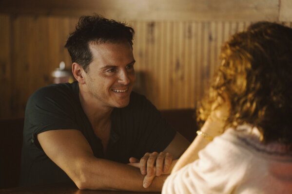 This image released by Searchlight Pictures shows Andrew Scott in a scene from "All of Us Strangers." (Searchlight Pictures via AP)