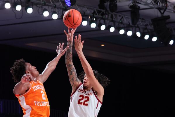In a photo provided by Bahamas Visual Services, Southern California's Tre White (22) shoots over Tennessee's Julian Phillip's (2) during an NCAA college basketball game in the Battle 4 Atlantis at Paradise Island, Bahamas, Thursday, Nov. 24, 2022. (Tim Aylen/Bahamas Visual Services via AP)