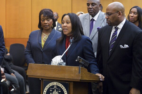 FILE - Fulton County Chief Senior Assistant District Attorney Fani Willis speaks during a news conference following sentencing for 10 of the 11 defendants convicted in a scheme to inflate Atlanta public school students’ standardized test scores on April 14, 2015, in Atlanta, Ga. Willis' most prominent case as an assistant district attorney was a RICO prosecution against a group of Atlanta public school educators accused in a scheme to inflate students’ standardized test scores. After a seven-month trial, a jury in April 2015 convicted 11 of them on the racketeering charge. (Kent D. Johnson/Atlanta Journal-Constitution via AP, Pool)