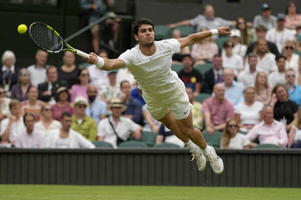 Spain's Carlos Alcaraz beats Novak Djokovic to win men's singles final at  Wimbledon