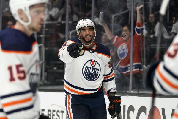 Edmonton Oilers left wing Evander Kane, center, celebrates his goal during the third period in Game 3 of an NHL hockey Stanley Cup first-round playoff series against the Los Angeles Kings Friday, May 6, 2022, in Los Angeles. It was his third goal of the game. (AP Photo/Mark J. Terrill)