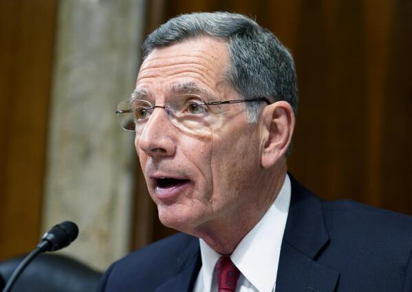 FILE - Sen. John Barrasso, R-Wyo., speaks during a Senate Energy and Natural Resources hearing, May 5, 2022, on Capitol Hill in Washington. Kentucky officials say they won't start paying out $21 million in economic incentives for a proposed electric vehicle battery facility until the company further explains why the U.S. Department of Energy abruptly rejected a $200 million loan for the project after some congressional Republicans argued the firm has improper ties to China. In February, Sen. Barrasso questioned whether the planned grant to Microvast would benefit China. Barrasso cited a company filing with the Securities and Exchange Commission in which Microvast said it may not be able to protect its intellectual property rights in China. (AP Photo/Mariam Zuhaib, file)