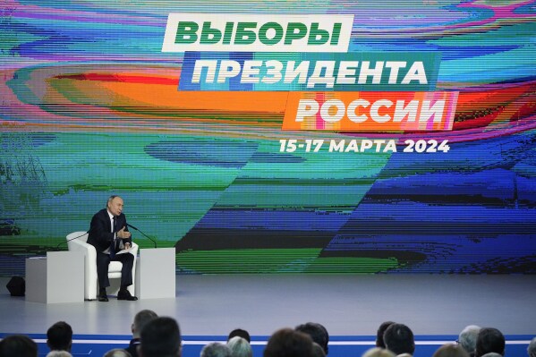 FILE - Russian President Vladimir Putin attends a meeting with his election campaign activists in Moscow, Russia, Wednesday, Jan. 31, 2024. Voting will largely be carried out in Russia at polling stations over three days between March 15-17. (AP Photo/Alexander Zemlianichenko, Pool)