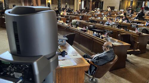 One of several cameras set up to capture live debate in the chamber of the Nebraska Legislature is shown, Wednesday, June 7, 2023, in Lincoln, Neb. State lawmakers say their emails and phone contacts this session revealed a growing number of people who watched the Nebraska Legislature's debates this year either on public television or on their computers, phones and tablets. Some even streamed the debate in their cars. (AP Photo/Margery Beck)