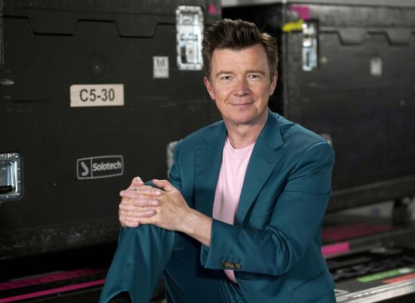 British singer-songwriter Rick Astley poses for a portrait before a concert at the Allstate Arena in Rosemont, Ill., on June 17, 2022. Astley has joined New Kids on the Block, Salt-N-Pepa, and En Vogue for the 57-date "Mixtape 2022" U.S. arena tour this summer. (AP Photo/Charles Rex Arbogast)