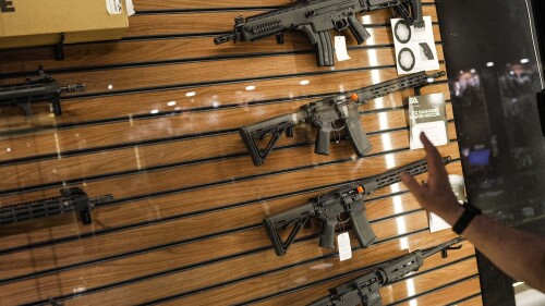 FILE - Shooting club owner Charles Blagitz shows machine guns at his shooting club in Sao Paulo, Brazil, Oct. 25, 2022. Brazil’s President Luiz Inácio Lula da Silva signed a decree July 21, 2023 tightening restrictions on civilian access to guns in Brazil. (AP Photo/Matias Delacroix, File)