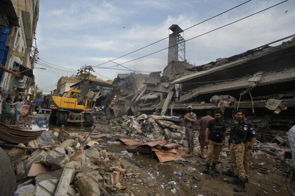 The world in brief: Karachi high-rise fire kills 10, injures 22